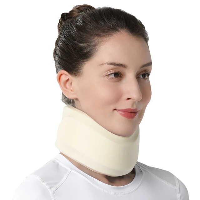 middle-aged woman wearing the white CerviRest Neck Brace, exuding comfort and relaxation. This neck brace, crafted from soft hypoallergenic foam, provides adjustable support levels for a serene and comfortable sleep experience.